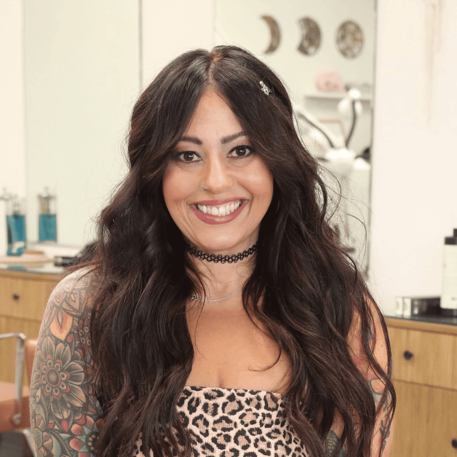 Portrait of Theresa, a professional stylist at Dream Hair Studio, showcasing their expertise and style.